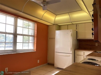 Opportunity knocks with this spacious F unit in Palm Aire on Oaks Country Club in Florida - for sale on GolfHomes.com, golf home, golf lot