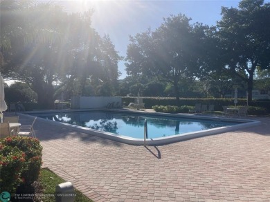 Opportunity knocks with this spacious F unit in Palm Aire on Oaks Country Club in Florida - for sale on GolfHomes.com, golf home, golf lot