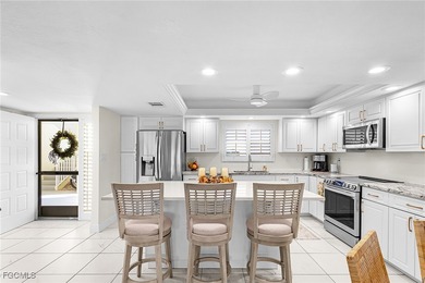 Discover this charming 1st-floor condo in Carriedale Gardens on Fiddlesticks Country Club in Florida - for sale on GolfHomes.com, golf home, golf lot