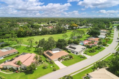 Tranquil, updated, solid-block pool home with distant golf on The Meadows Golf and Country Club in Florida - for sale on GolfHomes.com, golf home, golf lot