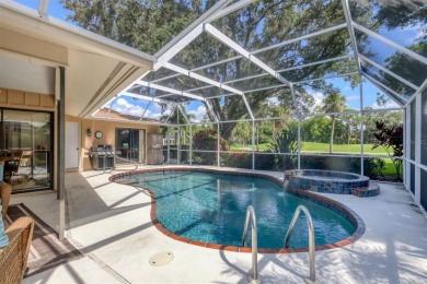 Tranquil, updated, solid-block pool home with distant golf on The Meadows Golf and Country Club in Florida - for sale on GolfHomes.com, golf home, golf lot