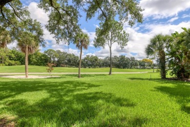 Tranquil, updated, solid-block pool home with distant golf on The Meadows Golf and Country Club in Florida - for sale on GolfHomes.com, golf home, golf lot