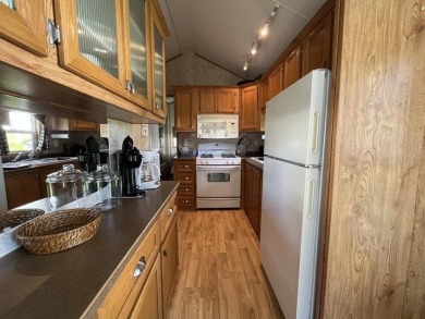 This well-maintained, fully-furnished, 1-bedroom, 1-bathroom on Apple Island Golf Course At Apple Island Resort in Vermont - for sale on GolfHomes.com, golf home, golf lot