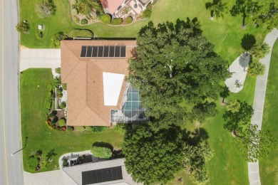 Tranquil, updated, solid-block pool home with distant golf on The Meadows Golf and Country Club in Florida - for sale on GolfHomes.com, golf home, golf lot