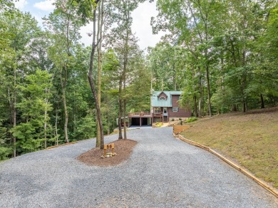 Come home to this impeccably maintained 3 BR/3 BA mountain cabin on White Path Golf Club in Georgia - for sale on GolfHomes.com, golf home, golf lot