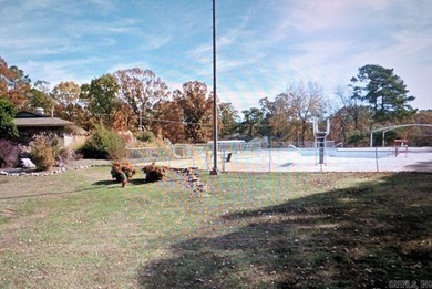Attention (Swimming Pool is across the street)) - Level building on Diamondhead Golf and Country Club in Arkansas - for sale on GolfHomes.com, golf home, golf lot