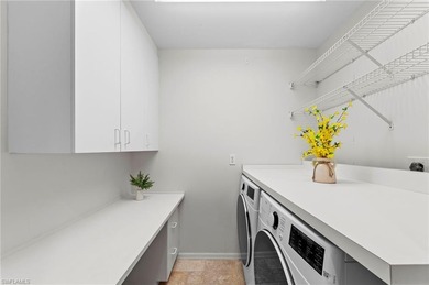 Step into a peaceful retreat designed for effortless everyday on Estero Country Club in Florida - for sale on GolfHomes.com, golf home, golf lot