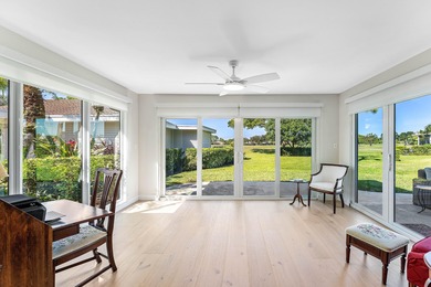 This beautifully redesigned 2-bedroom, 2-bath residence is on Eastpointe Country Club in Florida - for sale on GolfHomes.com, golf home, golf lot