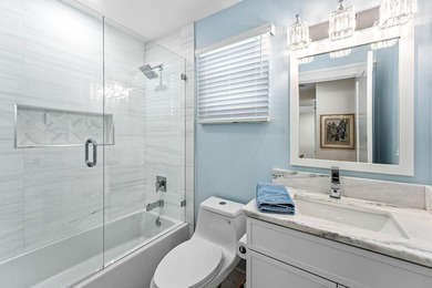 This beautifully redesigned 2-bedroom, 2-bath residence is on Eastpointe Country Club in Florida - for sale on GolfHomes.com, golf home, golf lot