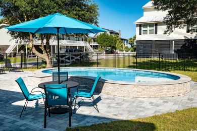 415 Sundial Drive | South Litchfield Beach  Just steps from the on Pawleys Plantation Golf and Country Club in South Carolina - for sale on GolfHomes.com, golf home, golf lot
