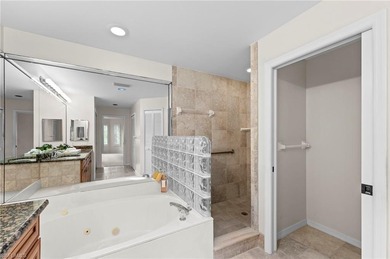 Step into a peaceful retreat designed for effortless everyday on Estero Country Club in Florida - for sale on GolfHomes.com, golf home, golf lot