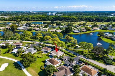 This beautifully redesigned 2-bedroom, 2-bath residence is on Eastpointe Country Club in Florida - for sale on GolfHomes.com, golf home, golf lot