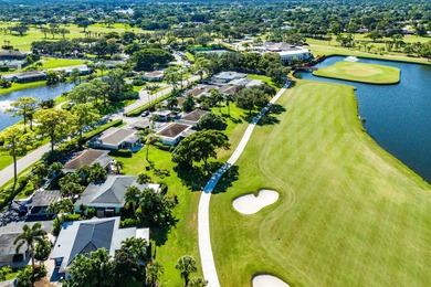 This beautifully redesigned 2-bedroom, 2-bath residence is on Eastpointe Country Club in Florida - for sale on GolfHomes.com, golf home, golf lot
