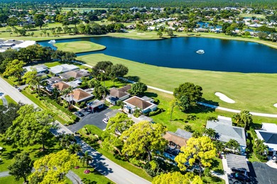 This beautifully redesigned 2-bedroom, 2-bath residence is on Eastpointe Country Club in Florida - for sale on GolfHomes.com, golf home, golf lot