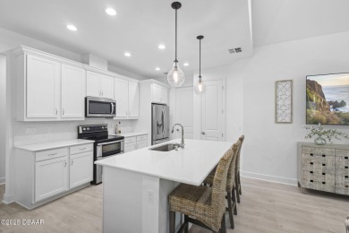 Dreamsicle Delight! Preserve Views, Premium Upgrades & Porch on LPGA International Golf Course in Florida - for sale on GolfHomes.com, golf home, golf lot