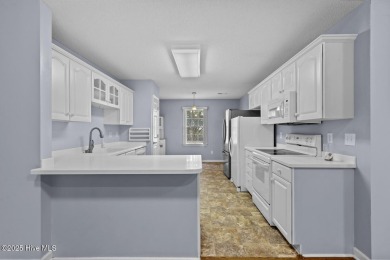 Welcome to this charming 3-bedroom, 2-bathroom home located in on Harbour Point Golf Club in North Carolina - for sale on GolfHomes.com, golf home, golf lot