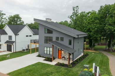 Contemporary and Comfortable!  Step into modern comfort with on Mariners Landing Golf and Country Club in Virginia - for sale on GolfHomes.com, golf home, golf lot
