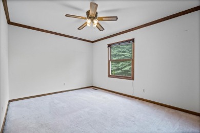Nestled on a quiet cul-de-sac, this lovely home offers privacy on Bliss Creek Golf Club in Illinois - for sale on GolfHomes.com, golf home, golf lot