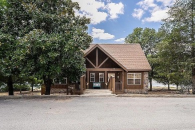 See this beautiful Lakefront Condo in the prestigious and highly on Ledgestone Country Club and Golf Course in Missouri - for sale on GolfHomes.com, golf home, golf lot