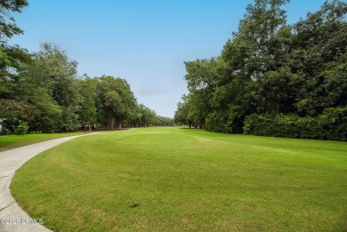 Discover the perfect blend of simplicity and convenience in this on Dataw Island Club in South Carolina - for sale on GolfHomes.com, golf home, golf lot