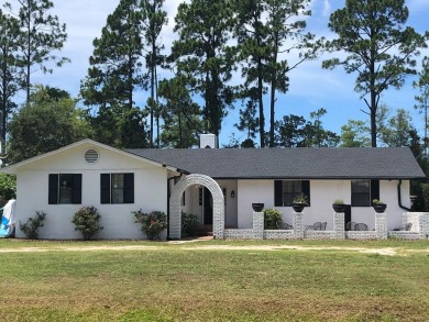 Enjoy gorgeous water views from the private front courtyard of on St. James Bay in Florida - for sale on GolfHomes.com, golf home, golf lot