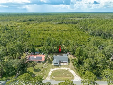 Enjoy gorgeous water views from the private front courtyard of on St. James Bay in Florida - for sale on GolfHomes.com, golf home, golf lot