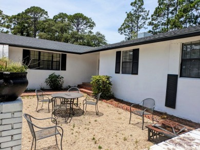 Enjoy gorgeous water views from the private front courtyard of on St. James Bay in Florida - for sale on GolfHomes.com, golf home, golf lot