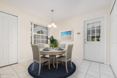 This end-unit villa condominium offers scenic golf course views on Spruce Creek Golf Club in Florida - for sale on GolfHomes.com, golf home, golf lot