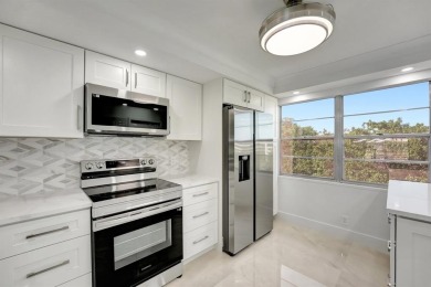 Price Reduced! Stunning Corner Unit in Wynmoor! ALL appliances on Wynmoor Golf Course in Florida - for sale on GolfHomes.com, golf home, golf lot