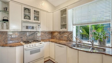 Welcome to this beautifully maintained 2-bedroom, 2-bath home on University Park Country Club in Florida - for sale on GolfHomes.com, golf home, golf lot