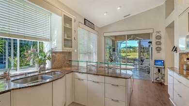Welcome to this beautifully maintained 2-bedroom, 2-bath home on University Park Country Club in Florida - for sale on GolfHomes.com, golf home, golf lot