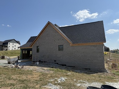 Stunning new construction located in a premier gated golf course on The Bull At Boones Trace in Kentucky - for sale on GolfHomes.com, golf home, golf lot