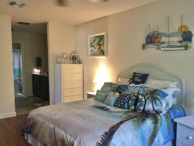 Move right into this concrete block home that backs up to the on Spanish Lakes I in Florida - for sale on GolfHomes.com, golf home, golf lot