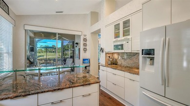 Welcome to this beautifully maintained 2-bedroom, 2-bath home on University Park Country Club in Florida - for sale on GolfHomes.com, golf home, golf lot