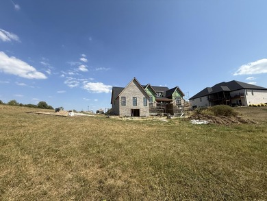 Stunning new construction located in a premier gated golf course on The Bull At Boones Trace in Kentucky - for sale on GolfHomes.com, golf home, golf lot