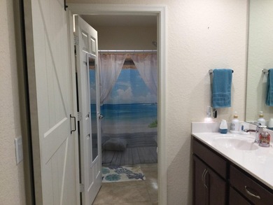 Move right into this concrete block home that backs up to the on Spanish Lakes I in Florida - for sale on GolfHomes.com, golf home, golf lot