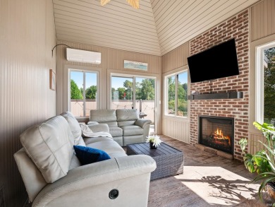 Experience refined waterfront living on Lake Wawasee in this on Wawasee Golf Club in Indiana - for sale on GolfHomes.com, golf home, golf lot