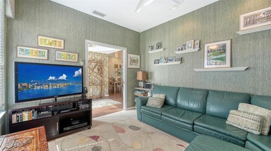 Welcome to this beautifully maintained 2-bedroom, 2-bath home on University Park Country Club in Florida - for sale on GolfHomes.com, golf home, golf lot