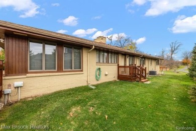 Experience the charm and tranquility of lakefront living in this on Forest Lake Country Club in Michigan - for sale on GolfHomes.com, golf home, golf lot