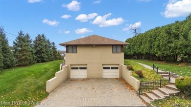 Experience the charm and tranquility of lakefront living in this on Forest Lake Country Club in Michigan - for sale on GolfHomes.com, golf home, golf lot