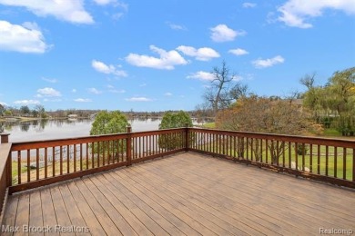 Experience the charm and tranquility of lakefront living in this on Forest Lake Country Club in Michigan - for sale on GolfHomes.com, golf home, golf lot