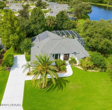 Welcome to this beautifully updated move-in ready pool home in on Plantation Bay Golf and Country Club in Florida - for sale on GolfHomes.com, golf home, golf lot