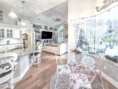 Welcome to this beautifully updated move-in ready pool home in on Plantation Bay Golf and Country Club in Florida - for sale on GolfHomes.com, golf home, golf lot