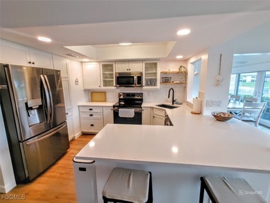 Introducing a delightful First FLOOR residence with upgraded on Hideaway Country Club in Florida - for sale on GolfHomes.com, golf home, golf lot