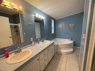 Listed by the Official Sales Team of Cypress Lakes Village on Big Cypress Golf and Country Club in Florida - for sale on GolfHomes.com, golf home, golf lot