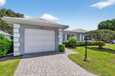 THIS COMPLETELY REMODELED VILLA HAS WIDE OPEN VIEWS OF THE 15TH on Delray Dunes Golf and Country Club in Florida - for sale on GolfHomes.com, golf home, golf lot