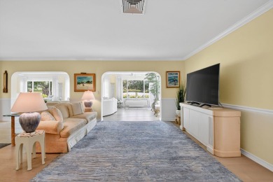 THIS COMPLETELY REMODELED VILLA HAS WIDE OPEN VIEWS OF THE 15TH on Delray Dunes Golf and Country Club in Florida - for sale on GolfHomes.com, golf home, golf lot