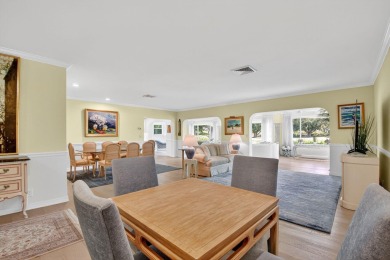 THIS COMPLETELY REMODELED VILLA HAS WIDE OPEN VIEWS OF THE 15TH on Delray Dunes Golf and Country Club in Florida - for sale on GolfHomes.com, golf home, golf lot