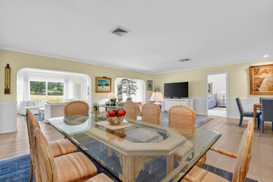 THIS COMPLETELY REMODELED VILLA HAS WIDE OPEN VIEWS OF THE 15TH on Delray Dunes Golf and Country Club in Florida - for sale on GolfHomes.com, golf home, golf lot