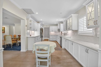 THIS COMPLETELY REMODELED VILLA HAS WIDE OPEN VIEWS OF THE 15TH on Delray Dunes Golf and Country Club in Florida - for sale on GolfHomes.com, golf home, golf lot